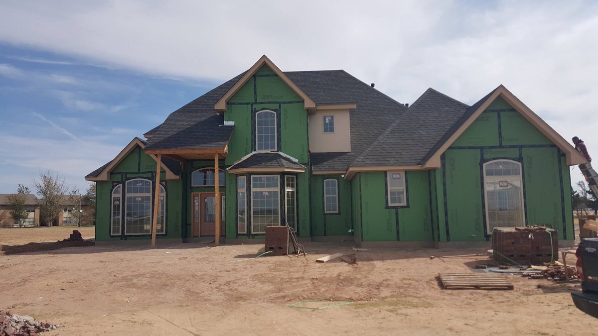 A new-construction home in the Texas panhandle with its shingle roof completed by Lopez Brother Roofing